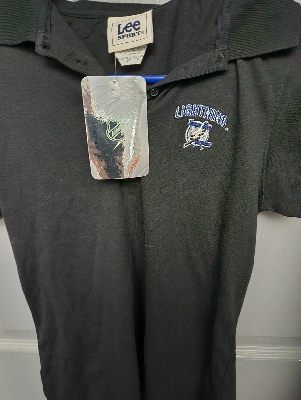 Woman 's Black Lightning Embroidered Polo Shirt